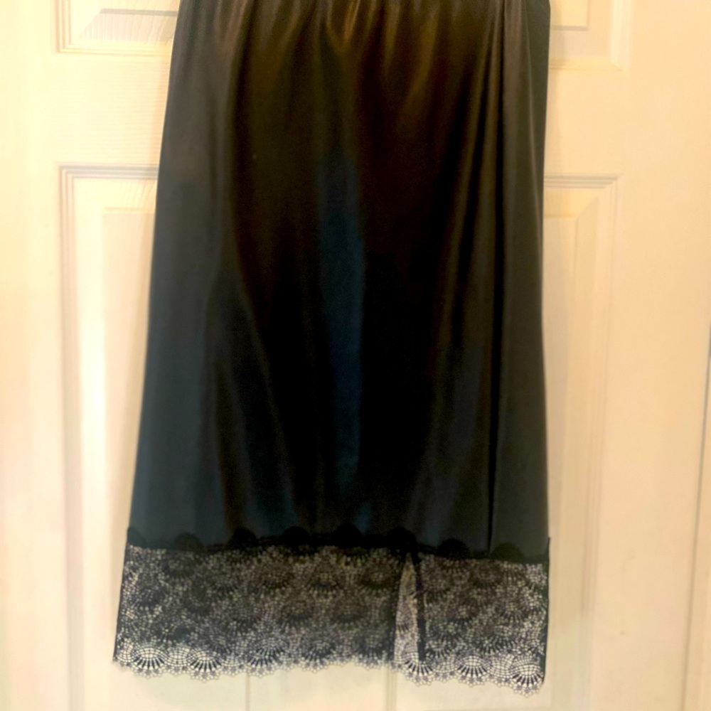 Faux leather Michael Kors Pencil skirt with black lace trim at bottom. From 2020